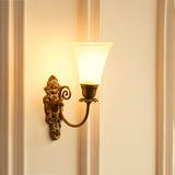 Divine Trends Brass Antique Finish Carved Wall Lamp with Frosted Hammered Glass Shade