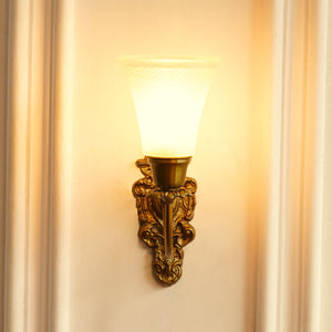 Divine Trends Brass Antique Finish Carved Wall Lamp with Frosted Hammered Glass Shade