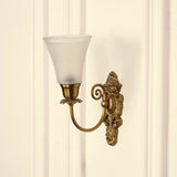 Divine Trends Brass Antique Finish Carved Wall Lamp with Frosted Hammered Glass Shade